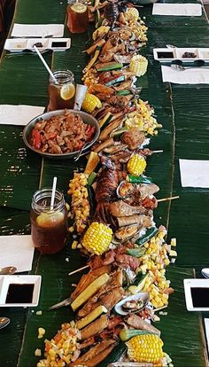 a long table filled with lots of food