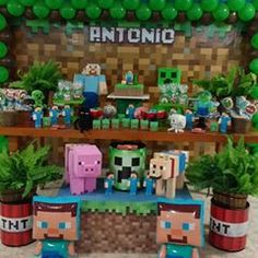 an image of a table with plants and minecraft decorations on it's display