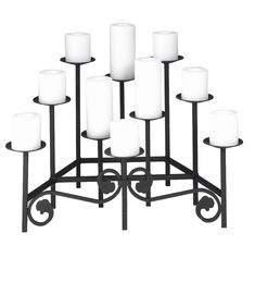 an iron candle holder with twelve white candles on it's sides and four black stands