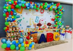 a birthday party with balloons and decorations