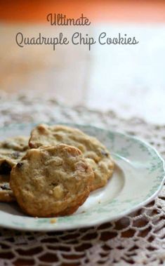 two cookies on a plate with the words ultimate quadruple chip cookies