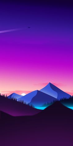 the sky is purple and pink with mountains in the background