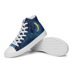 Step into the magic of the night with these celestial-themed high-top canvas sneakers, featuring a stunning moon and star design. Perfect for casual outings or adding a cosmic touch to your style, these sneakers offer comfort and durability with a padded collar, breathable lining, and lightweight EVA rubber outsole. *100% polyester canvas upper side  *Ethylene-vinyl acetate (EVA) rubber outsole *Breathable lining, soft insole *Faux leather toe cap *Padded collar, lace-up front  *Blank product so Canvas Sneakers, Shoes Trainers, Star Designs, Canvas Shoes, Womens Shoes Sneakers, Baskets, High Tops, High Top Sneakers, Athletic Shoes