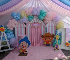 a circus themed birthday party with balloons and decorations