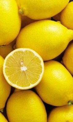 a pile of lemons sitting next to each other