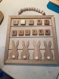 a wooden frame with letters spelling happy easter