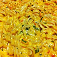 a close up view of some noodles and cheese