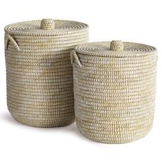 two woven baskets with handles on each side, one is white and the other is beige