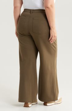 A go-to for any day of the week, these trouser-inspired pants are made from soft stretch twill with a high waist and full-length wide legs. 29" inseam; 30" leg opening; 12 3/4" front rise; 19" back rise (size 18W) Zip fly with button closure Front slant pockets 72% rayon, 24% nylon, 4% spandex Hand wash, line dry Imported Wide Leg Twill Pants, Hair Care Gifts, Oxford Heels, Walker Shoes, Holiday Pajamas, Jo Malone London, Platform Slippers, Twill Pants, Day Of The Week