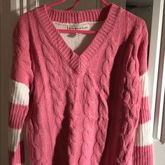 Poof Girl Excellence Long Sleeve V-Neck Cable Knit Sweater In Beautiful Combination Of Pink And White. Stylishly Cut Out Triangle At The Back. Cable Net Sweater, Hot Pink Sweater, Cable Knit Sweater, Pink Sweater, Pink And White, Pullover Sweater, Kids Shirts, Cable Knit, Pullover Sweaters