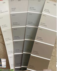 three different shades of gray and white paint on the same color scheme, each with matching colors