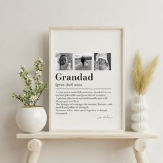 a white shelf topped with a framed photo next to a vase filled with flowers and plants