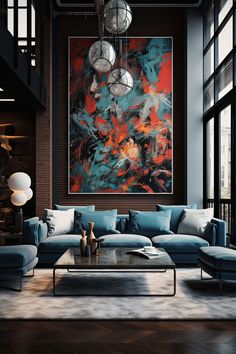 a living room filled with furniture and a large painting hanging on the wall above it