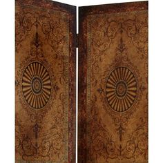 an intricately designed wooden panel with decorative designs on it's sides and the top section