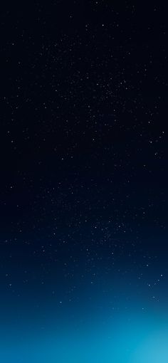 an airplane is flying through the night sky with stars in the background and some clouds