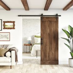 a living room filled with furniture and a wooden door