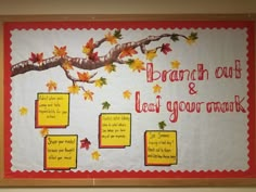 a bulletin board with fall leaves on it and words written in red, yellow and orange