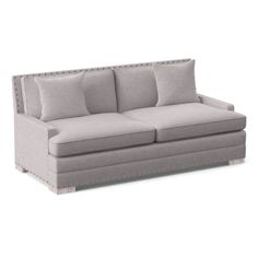 an image of a couch with pillows on the top and bottom part, in grey linen