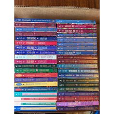 a box full of children's books sitting on top of a table