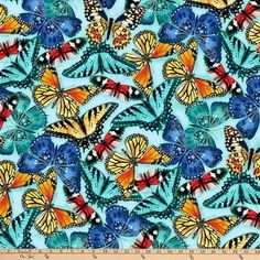 a blue and yellow butterfly print fabric