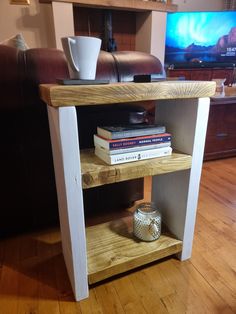 a wooden shelf with books on top of it