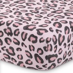 Our 3-Piece baby crib bedding set for boys and/or girls includes one crib quilt, one fitted crib sheet, and one crib skirt. The crib quilt features a printed center panel with an updated classic of all-over leopard print in shades of pink and black, pieced with a large pink border and leopard print binding. The fitted crib sheet matches the playful quilt center print, while the dust ruffle has layers of ruffled pink chiffon. All in soft microfiber for comfort and easy care. Pink And Gray Jungle Nursery Bedding, Blush Crib Bedding Set, Pink Boho Crib Bedding, Crib Bed Sets, Cat Crib Bedding, Pastel Pink And Gray Leopard Minky Fabric, Crib Comforter, Baby Crib Bedding Sets, Pink Border