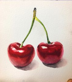 two cherries sitting on top of each other