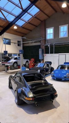 there are many cars parked in the garage