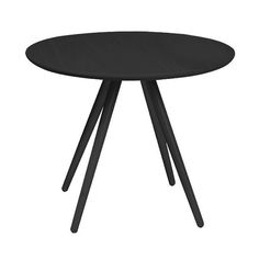 a black table with three legs and a round top