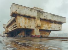 the building is made out of concrete and has multiple levels to support it's structure