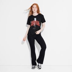 Take your casual style up a notch with this Women's Sabrina Carpenter Short Sleeve Graphic T-Shirt – Black. With Sabrina Carpenter graphics on the front, this tee gives a laid-back vibe. It is made from lightweight and breathable fabric that feels comfortable against your skin. Wear this women’s t-shirt with your favorite pair of jeans for a perfectly relaxed look. Edgy Short Sleeve T-shirt For Fall, Black Stretch Grunge T-shirt, Edgy Short Sleeve Fall T-shirt, Stretch Graphic Print Top Band Merch, Stretch Graphic Print Band Merch Tops, Stretch Graphic Print Tops For Band Merch, Stretch Top With Graphic Print Band Merch, Edgy Fitted T-shirt For Fall, Stretch Tops With Graphic Print For Band Merch