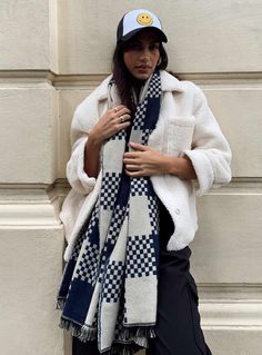 Scarf   100% polyester  Hero Image: Jess  Soft knit material   Check print   Good stretch   Frayed edges     Length: 200cm / 78.7in   Width: 68cm / 26.7in Scarf Winter Outfit, Black Flared Jeans, Hero Image, Faux Fur Material, Fluffy Jacket, White Scarf, Checked Scarf, White Scarves, Fleece Dress