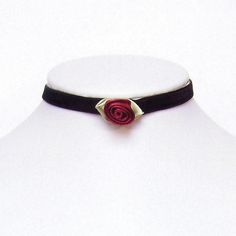 The Amelia velvet choker with a beautiful dark red silk rosebud.  This choker is simple yet stunning and elegant when worn, made from beautiful velvet and featuring a dark red silk rosebud in the centre.  The velvet is finished off securely with a lobster claw clasp and an extender chain which allows the choker to be worn at any size from 13 inches to 15.5 inches. With the addition of an extender chain you can be sure of getting the fit you want and can choose between wearing the choker higher or lower on the neck.  This item can be made larger or smaller if required at no extra cost.  The Amelia choker is available in Black, Dark red and purple in our Etsy store.  Gift wrapping All jewellery is beautifully presented and ready for gift giving, sprinkled with little silver stars and placed Maya Necklace, Victorian Steampunk Wedding, Profile Set, Dark Red Roses, Rose Choker, Gothic Elegance, Goth Choker, Lace Choker Necklace, Velvet Choker Necklaces