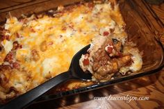 a casserole dish with meat and cheese on it is ready to be eaten