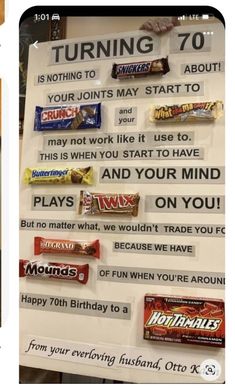 a sign with candy bars on it that says, turning 70 is nothing to do