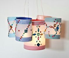 three colorful lamps hanging from the ceiling