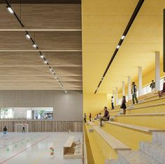 an indoor skating rink with stairs and people on the sidelines, in front of yellow walls