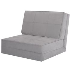 a gray couch with two pillows on it's back and the seat upholstered