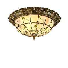 a ceiling light with a stained glass shade