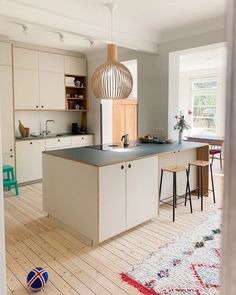 the kitchen is clean and ready to be used as a dining room or living room