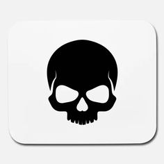 a black and white image of a skull on a square mouse pad with the word,