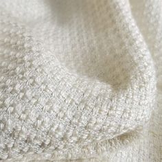 close up view of white fabric textured together