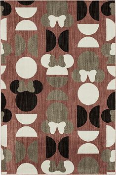 a rug with mickey mouses on it in brown, black and white colors is shown