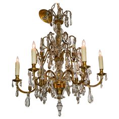 an old fashioned chandelier with crystal drops