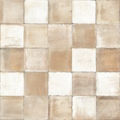 a white and brown tiled wall with no one in the photo or description on it