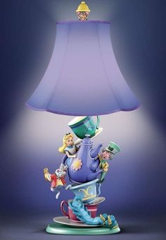 an illuminated lamp with characters on it and a purple shade over the top, in front of a dark blue background