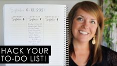 a woman holding up a planner with the words, hack your to - do list