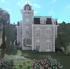 a large white house with a clock tower