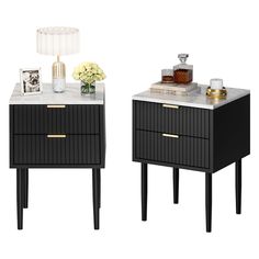 two black and white nightstands with gold accents