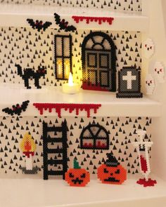 lego halloween decorations are displayed on shelves